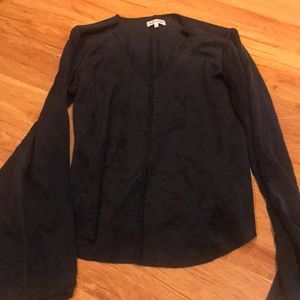 Black suede long sleeve shirt.